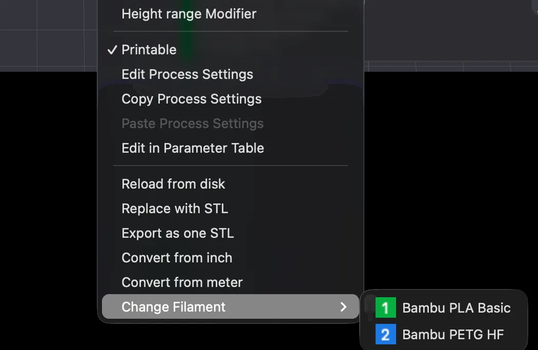 The right click menu on an object in Bambu Studio with Change Filament open, listing Bambu PLA Basic as 1 and Bambu PETG HF as 2