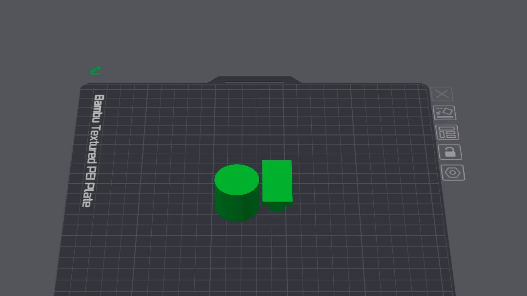 Bambu Studio Prepare view showing a cylinder and a T shaped test model on the textured build plate