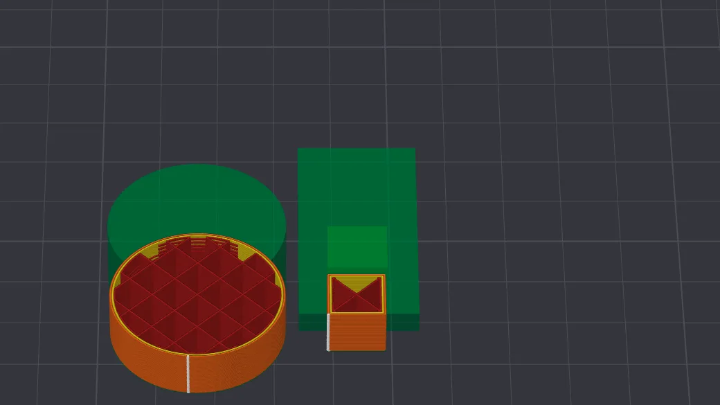 Bambu Studio Preview tab with a cylinder and a small part sliced to layer 44, walls in orange and yellow and sparse infill in dark red